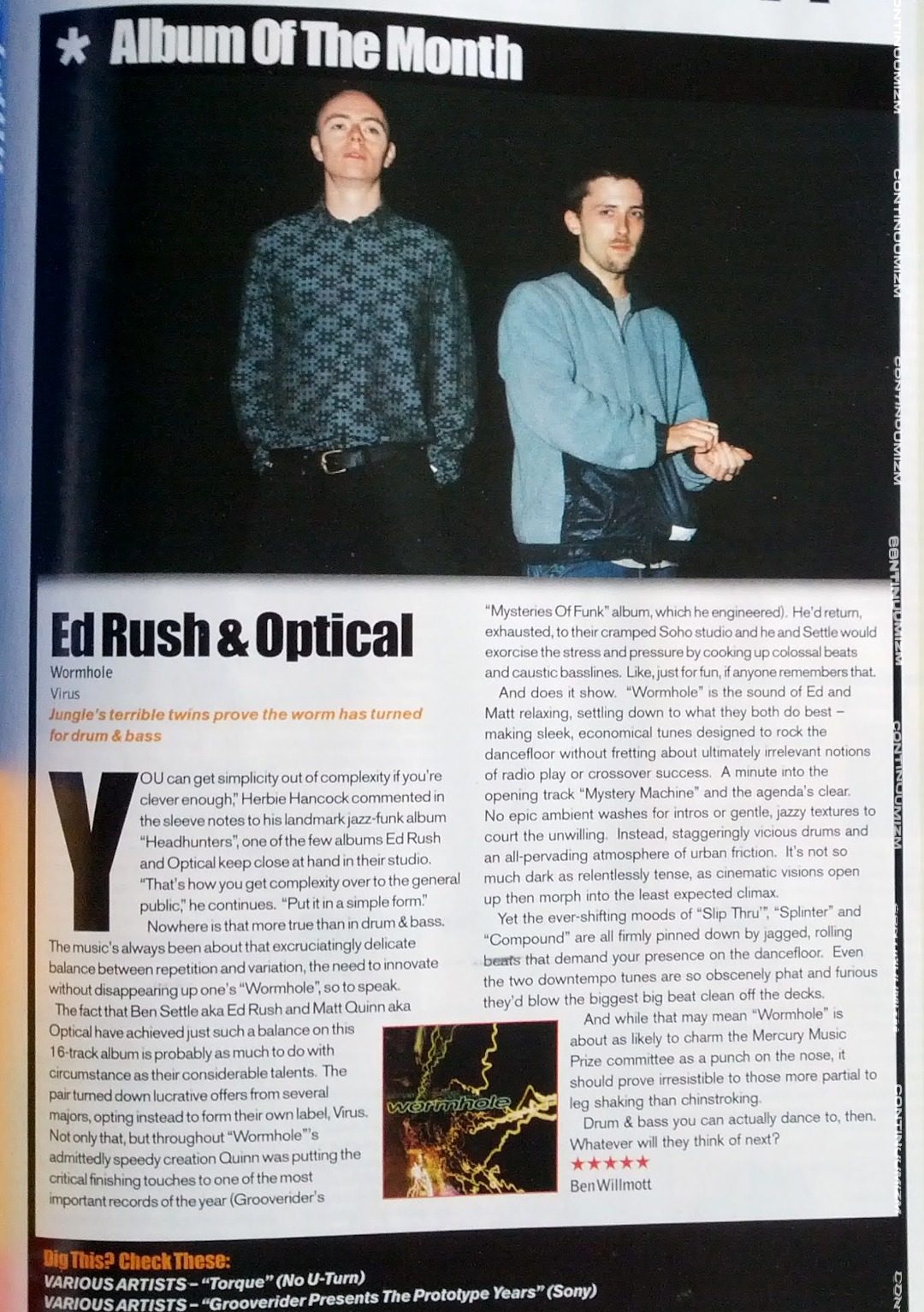 Ed Rush & Optical's Wormhole reviewed and Album of the Month notice in Muzik Magazine, December 1998. 'Jungle's terrible twins prove the worm has turned for drum & bass'. Photo of magazine open to the page.